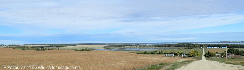 Looking North toward Gull Lake; the PRA is beyond the blue buildings and to the right. Gull Lake PRA (South), Note the round lake in middle of the image. 2024-09-22, P. Potter.