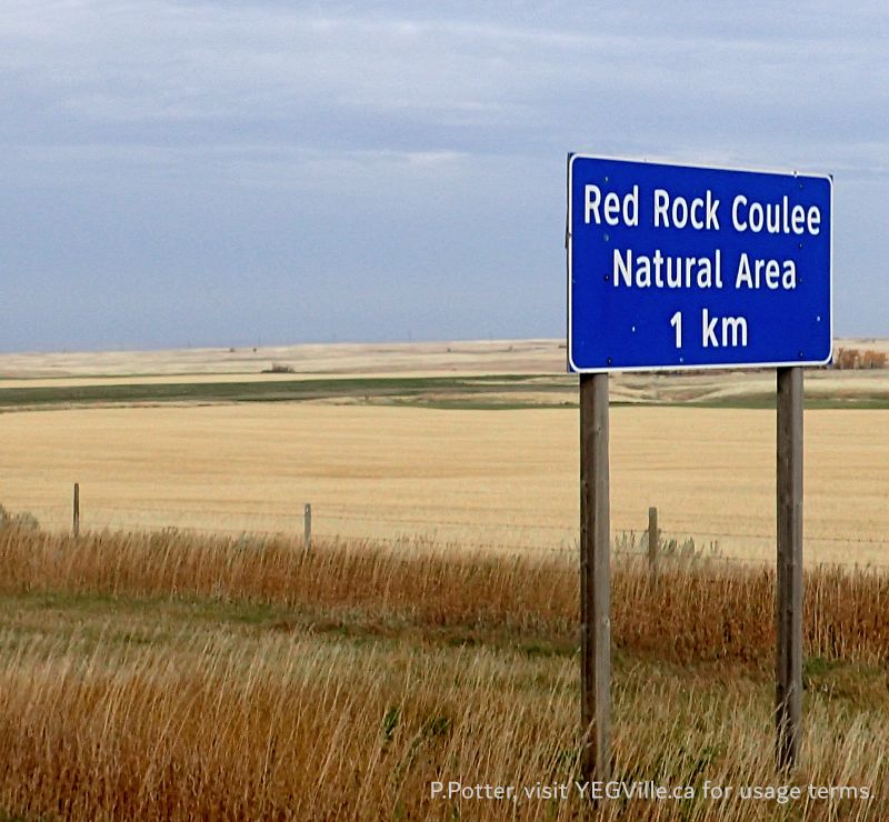 Sign on HWY 887, looking NW, Red Rock Coulee NA, 2024-10-16, P. Potter.