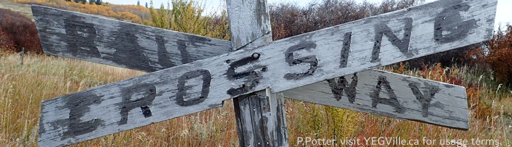 Weather beaten Railway Crossing Sign, East of the site, St Margaret Church, 2024-10-17, P. Potter.