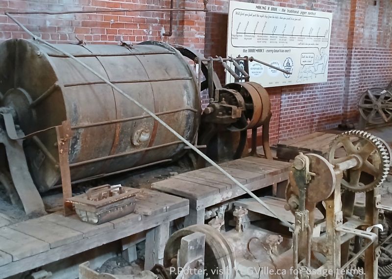 Making a bowl, an example of static information in the facility (back wall)., Medalta Potteries, 2024-10-17, P. Potter.