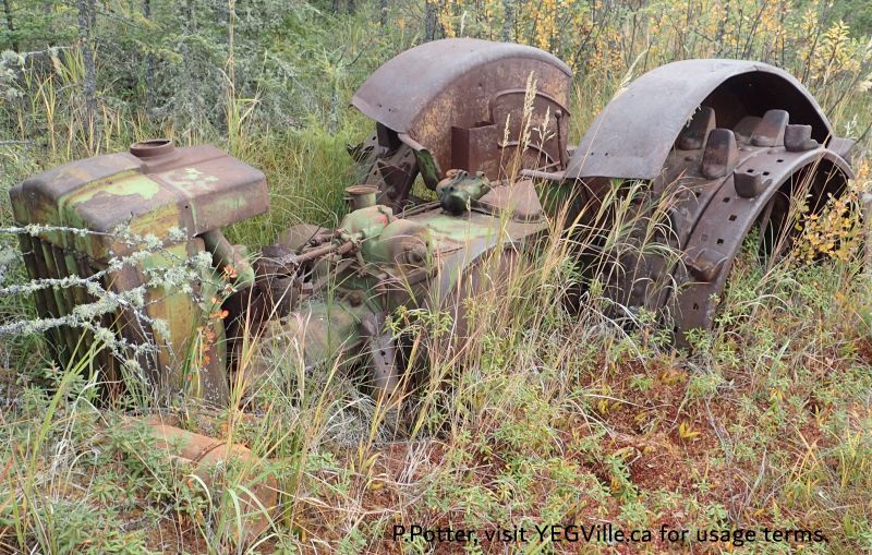 An abandoned tractor in the adjoining property but adjacent to the N border of the site, Battle Lake NA, 2024-09-25, P. Potter