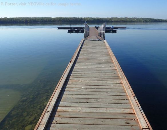 Dock extending into Moose Lake on Vezeau Beach, Bonnyville, AB, 2025-09-21, P. Potter.