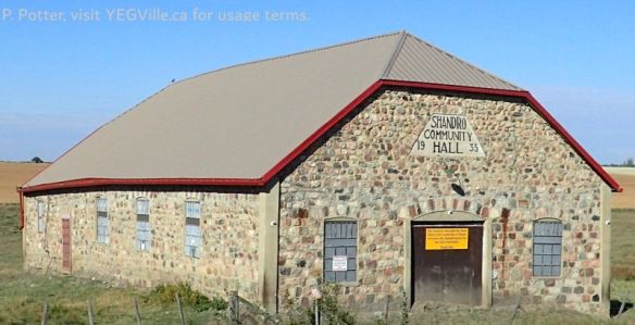 Made from 199 wagon loads of field stones, Shandro Community Hall was constructed in 1935, rebuilt but currently not safe for occupancy, 2025-09-21, P. Potter.