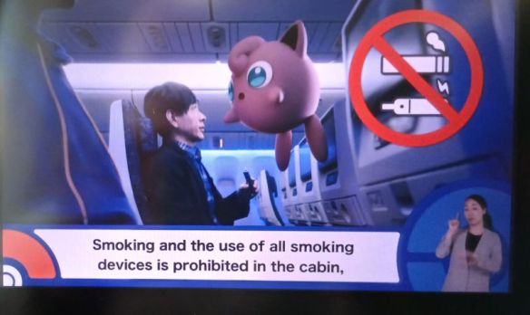 Pokemon themed safety video on the All Nippon Airways flight, 2026-03-25.