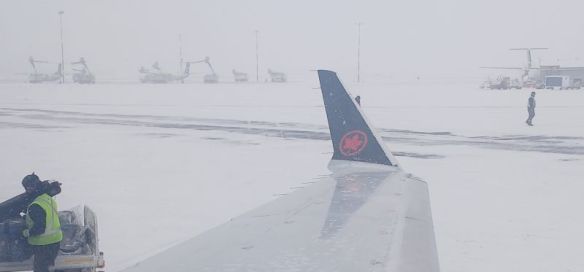 Whiteout on the runway of YEG, cause of take off delay, 2026-03-25, P. Potter.