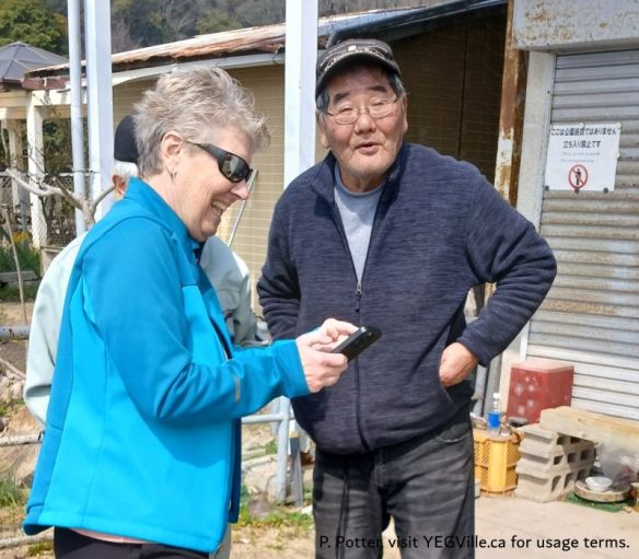 Danielle using local knowledge to find the access point to the cyclist Innoshima bridge, 2026-03-30, P. Potter.