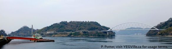 The Yutaka Sea Station (ferry) with Heira (left) and Nakanoshima Islands in the background, two of the three bridges visible, 2026-03-30, P. Potter.