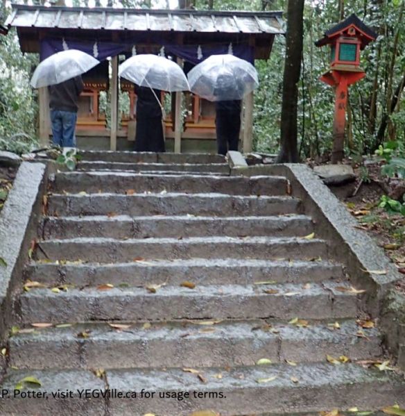 Three supplicants showing praying at one of the smaller shrines, 2026-04-04, Oyamazumi Shrine, Omishima, P. Potter.