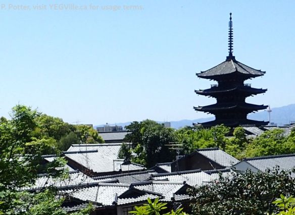 The tower poking above nearby buildings and trees, 2026-04-16, Toji Temple environ, Kyoto Japan, P. Potter.